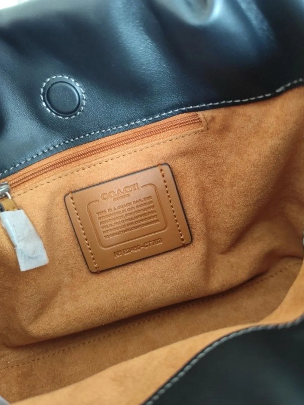Coach sleek black